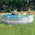 Intex Prism Frame Pool 305x76cm in garden with kids playing