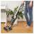 Sencor SVC 8936TI cordless stick vacuum cleaner cleaning hardwood floor, black
