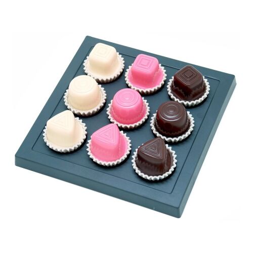 ThinkFun Chocolate Fix game board with chocolate pieces