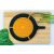 Fiskars Functional Form splatter screen on wooden board with vegetables