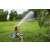 Gardena Comfort Turbine Sprinkler with Base watering a lawn