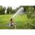 Gardena Comfort Turbine Sprinkler with Base watering a lawn