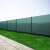 Springos Shade Net, 1.5m x 10m, green, installed on a fence