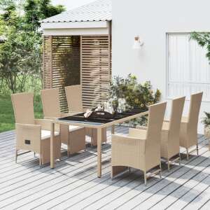 Beige polyrattan garden dining set with 6 chairs and a table, 7 pieces, on a wooden deck - Garden Set