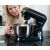 Woman using Ruhhy 1700W stand mixer to whip cream