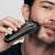 Man using Braun BT3342 beard trimmer to trim his beard