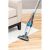 Bissell Featherweight Pro Eco stick vacuum cleaner cleaning a rug