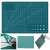 Green self-healing cutting mat, A5 size, with grid lines and angle guides, shown with other craft supplies