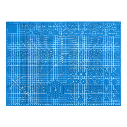 Blue self-healing cutting mat with grid lines, circles, triangles, and a hexagon for crafting and DIY projects