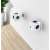 ALLOCACOC PowerCube Original DE 5-socket power strip, white and blue, with two power strips plugged into a wall outlet