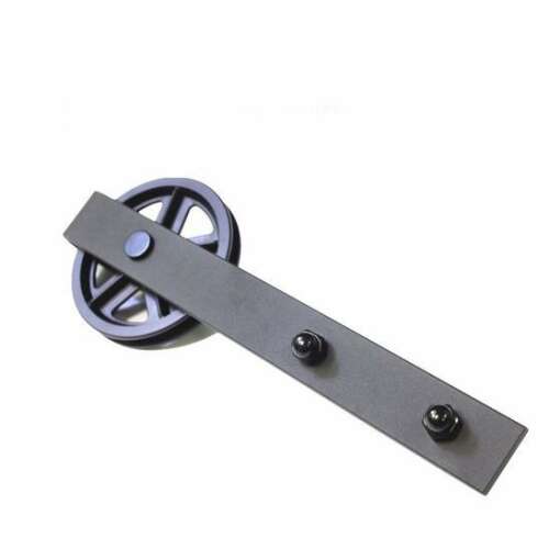 Tolóajtó szerkezet: közeli kép a tolóajtó görgőjéről