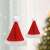 Red and white Santa hat shaped honeycomb paper Christmas decoration, hanging