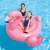 Intex Giant Flamingo Ride-On Pool Float, pink inflatable flamingo with handles, two people sitting on the float in the pool