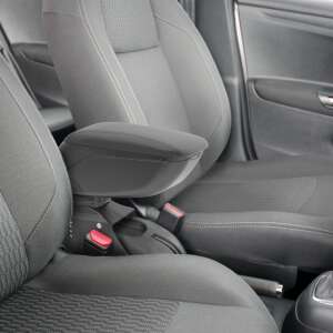 Black car armrest with storage box installed in a car - Car armrest