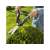 Gardena PrecisionCut hedge shears, woman using the shears to trim a hedge