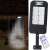 Solar powered street light with motion sensor and remote control, 128 LED, black, in use