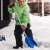Child using Fiskars 1001421 blue plastic snow shovel with silver handle and orange grip to clear snow