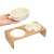Navaris 2-piece elevated pet bowl set with bamboo stand, white ceramic bowls, close-up