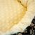 Close-up of Minky Pet Bed soft yellow cushion