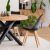 Mercaton black Scandinavian dining chair in a modern dining room setting