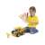 Child playing with Bburago Jr. Volvo dump truck toy, remote control, yellow
