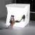 Light Room Photo Box with LED lighting, white foldable studio for product photography, example of use with shoes