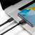 Baseus USB-C to USB-C cable charging a smartphone and a laptop