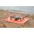 PGYTECH Pro drone landing mat with drone on top on a beach