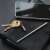 True Utility TELEPEN telescopic pen with keychain, keys and smartphone on a leather notebook