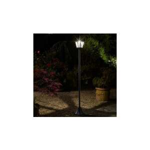 Fekete napelemes mozgásérzékelős kerti lámpa, amely éjszaka megvilágítja a kerti ösvényt - Kültéri állólámpa