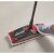 Vileda Ultramat Turbo flat mop in use with foot pressing the pedal