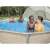 People enjoying a Bestway above ground pool with beige canopy