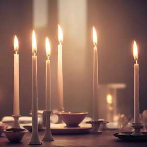 Burning white taper candles on a table, creating a warm ambiance - Candle