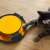 Cat playing with a rotating mouse toy, black and yellow interactive cat toy