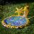 Inflatable splash pad with starfish and seahorse sprinklers in use