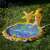 Inflatable splash pad with starfish and seahorse sprinklers in use