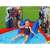 Child sliding down the slide of the Bestway Marvel Spider-man inflatable pool