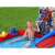 Child playing in the Bestway Marvel Spider-man inflatable pool with slide, basketball hoop, and water sprinkler