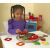 Gyermek játszik a Melissa & Doug Pizza játék szettel