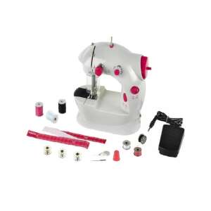 White and pink children's sewing machine with accessories - Household Toy