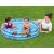 Children playing in Bestway Mickey Mouse inflatable pool in backyard setting