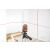 Neo Tools 360 laser level in use projecting lines on walls