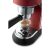 Close-up of DeLonghi Dedica Style EC685.R red espresso machine brewing espresso