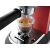 Close-up of DeLonghi Dedica Style EC685.R red espresso machine brewing espresso