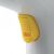 Close-up of Ariete 4167 handheld garment steamer yellow trigger
