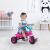 Dolu Unicorn Tricycle in use by a child, pink and blue, for ages 2+