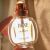 Christian Dior Dune Eau de Toilette kézben tartva