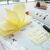 Stick'N 76x76mm 100 sheet yellow self-adhesive Z-folded notepad 100917407