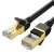 Close-up of UGREEN Cat 7 STP Ethernet cable connectors, gold-plated