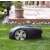 Greenworks Optimow 4 Robotermäher, schwarz, auf Gras